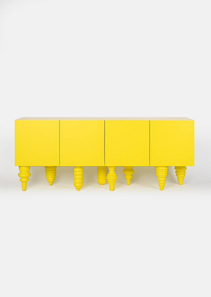 100281. sideboard on object stand yellow